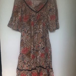 Mama called it a house dress. Simple cotton with a fun velvet trip on yoke.